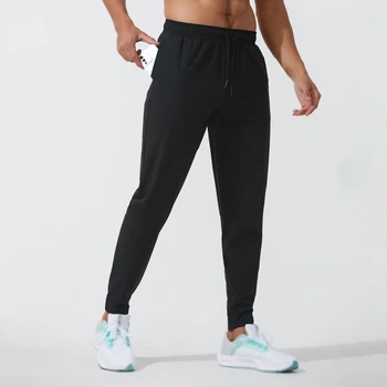 Быстросохнущие elastične hlače za trčanje na otvorenom za muškarce i žene, prozračna velike džepove, sportske hlače za fitness, košarku, tenis, sve sezone
